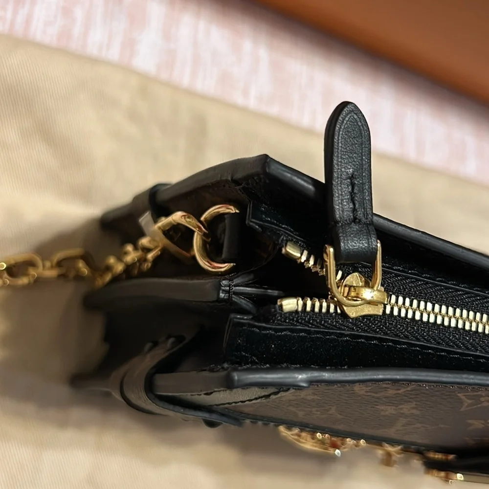 Louis Vuitton Trunk Clutch Reverse Monogram. New